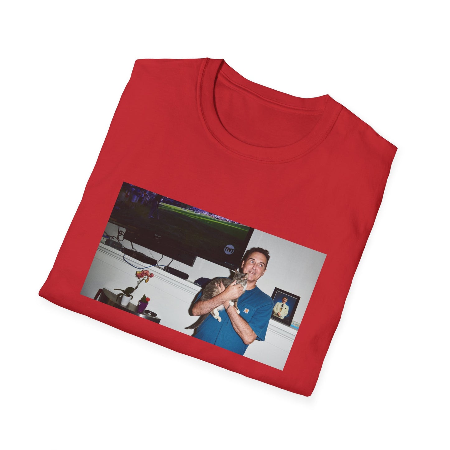 norm macdonald and his cat in front of a framed picture of steve martin tshirt