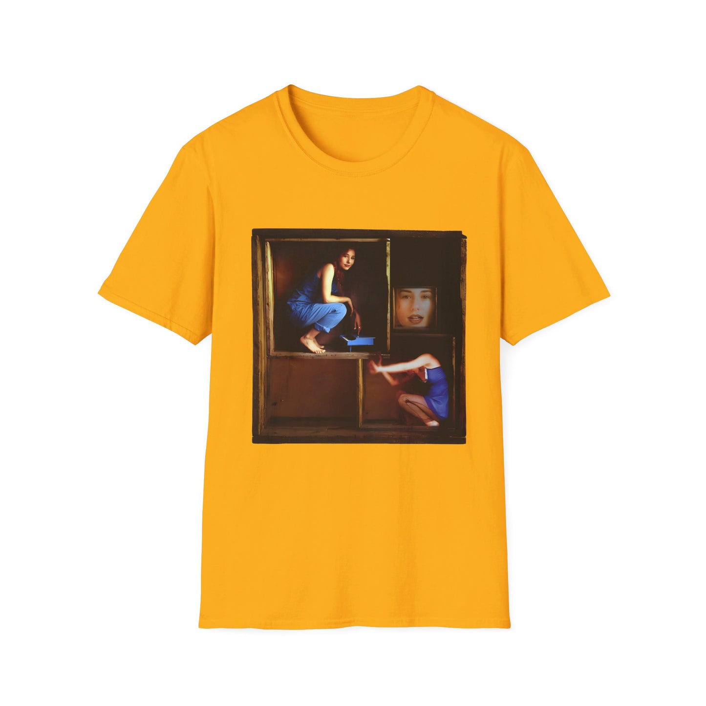 tori amos on a shelf in a crate playing a small piano surrounded by other amos's on a tshirt