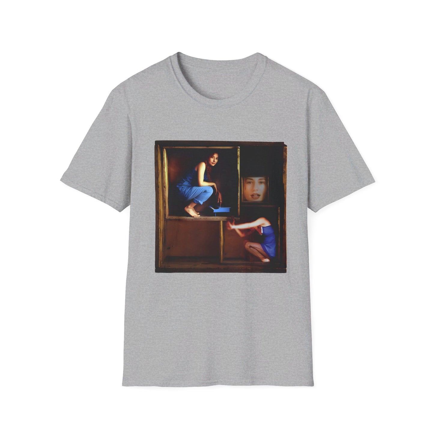 tori amos on a shelf in a crate playing a small piano surrounded by other amos's on a tshirt