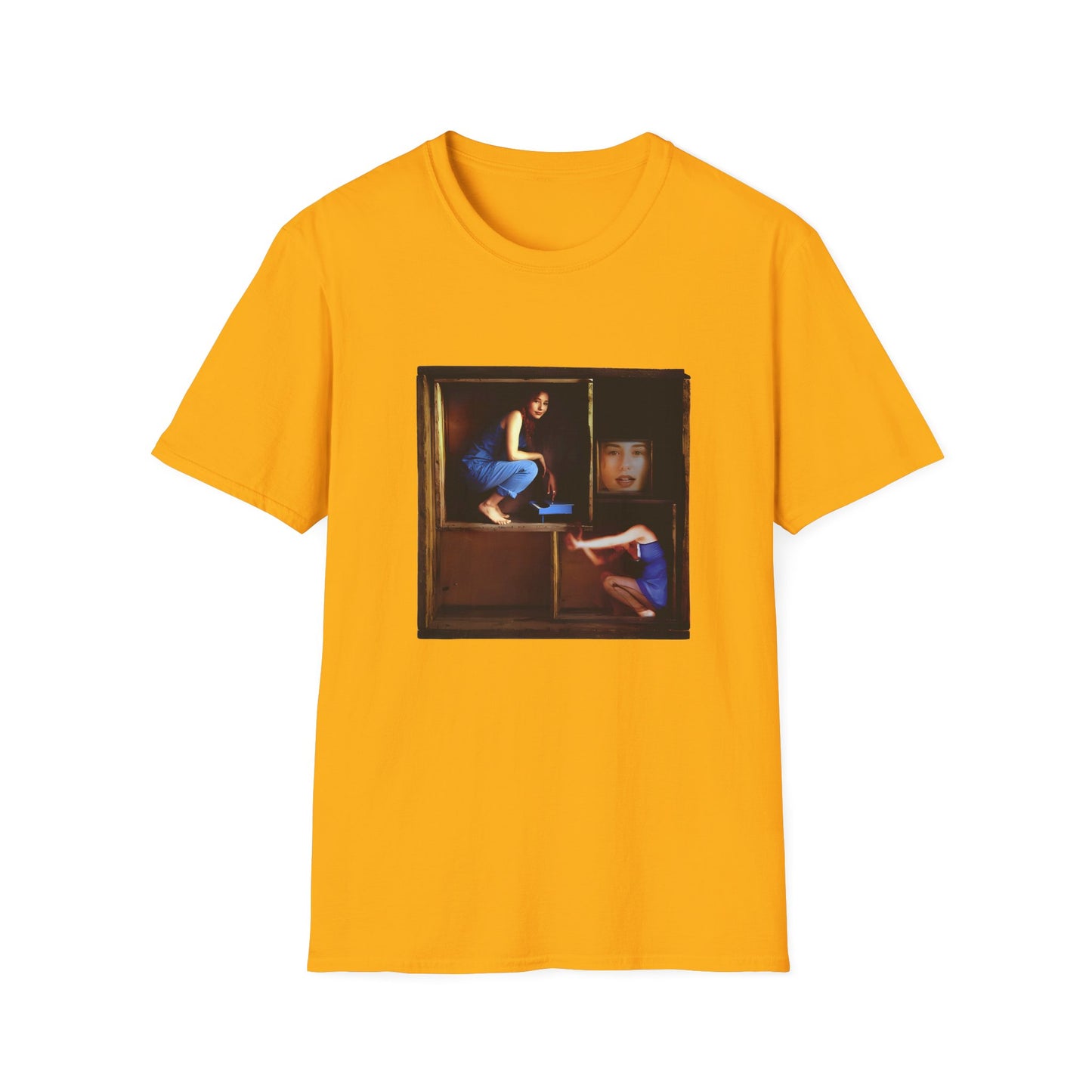 tori amos on a shelf in a crate playing a small piano surrounded by other amos's on a tshirt