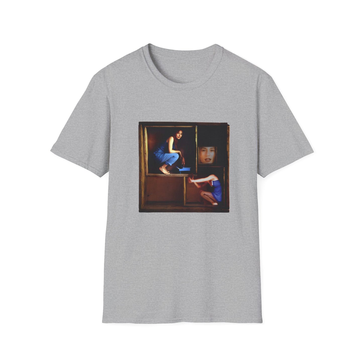 tori amos on a shelf in a crate playing a small piano surrounded by other amos's on a tshirt