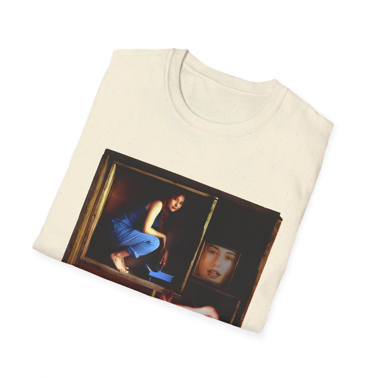 tori amos on a shelf in a crate playing a small piano surrounded by other amos's on a tshirt