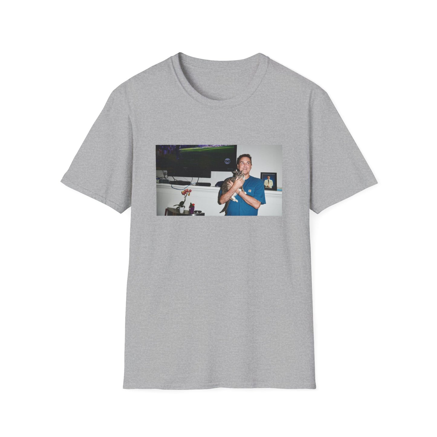 norm macdonald and his cat in front of a framed picture of steve martin tshirt