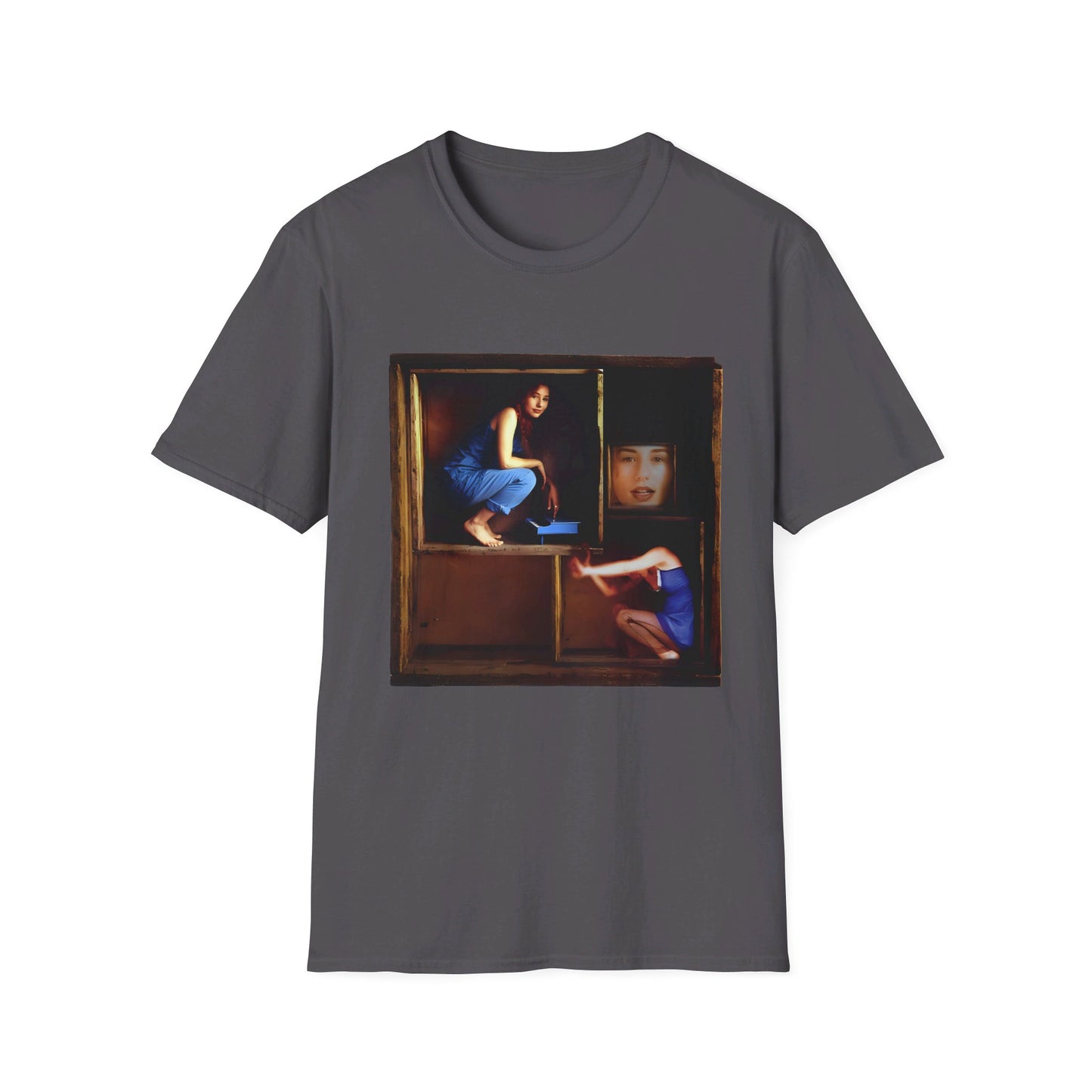 tori amos on a shelf in a crate playing a small piano surrounded by other amos's on a tshirt