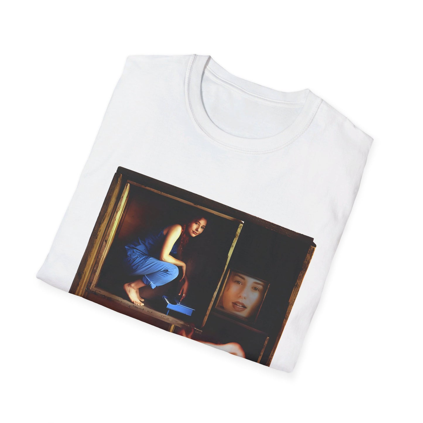 tori amos on a shelf in a crate playing a small piano surrounded by other amos's on a tshirt