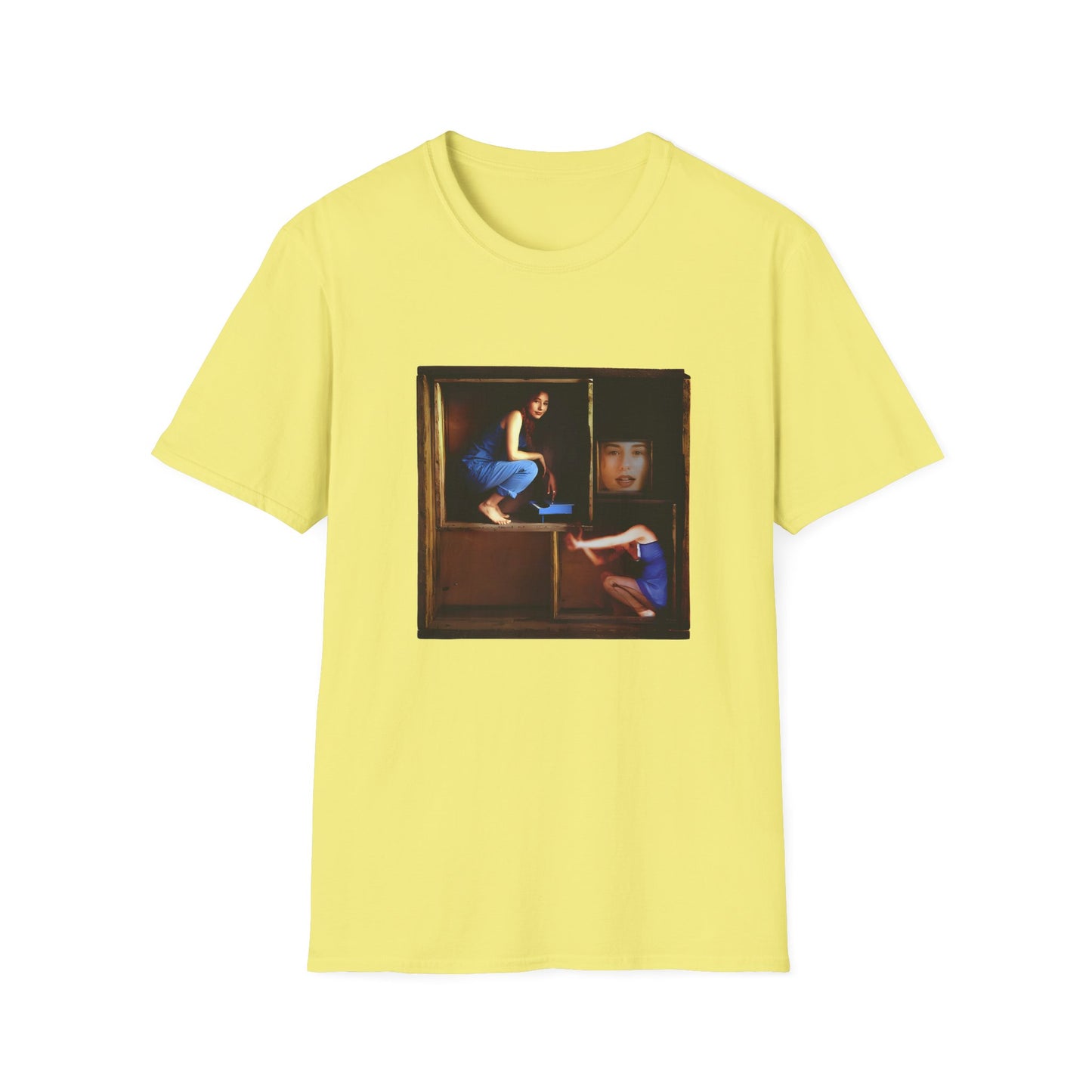 tori amos on a shelf in a crate playing a small piano surrounded by other amos's on a tshirt