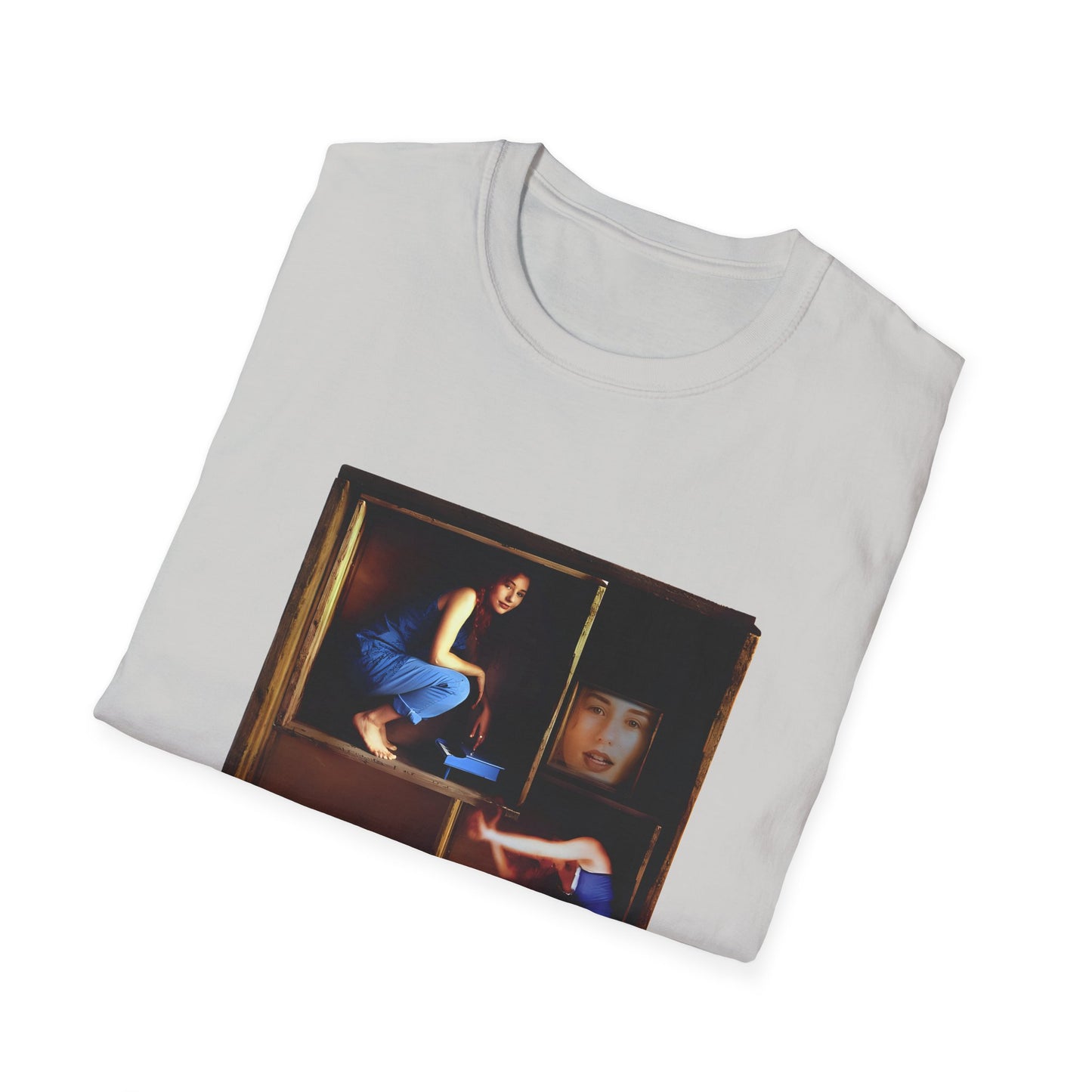 tori amos on a shelf in a crate playing a small piano surrounded by other amos's on a tshirt