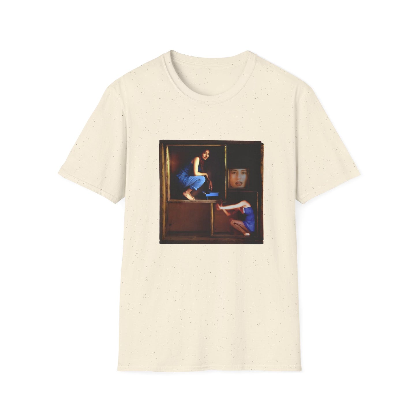 tori amos on a shelf in a crate playing a small piano surrounded by other amos's on a tshirt