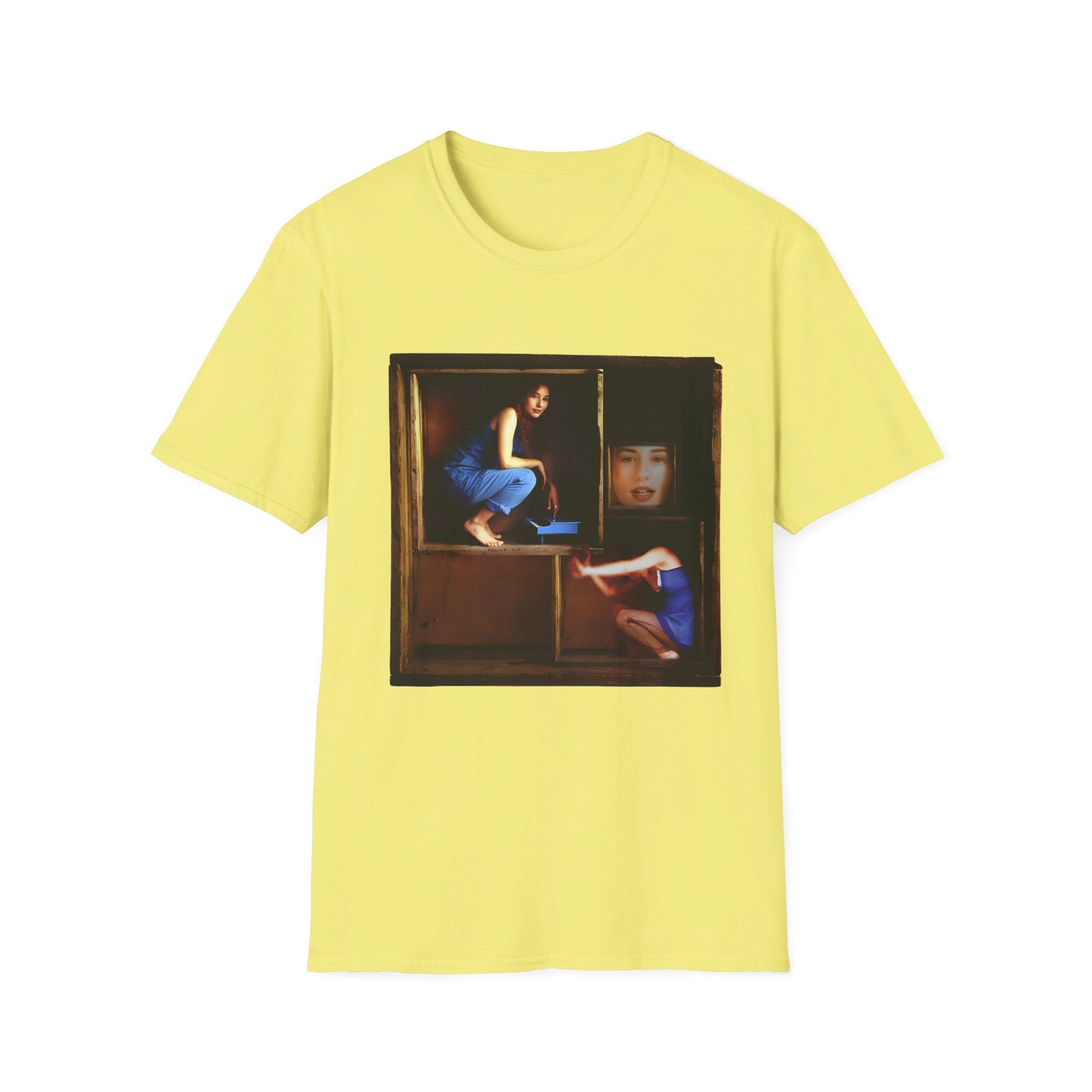 tori amos on a shelf in a crate playing a small piano surrounded by other amos's on a tshirt