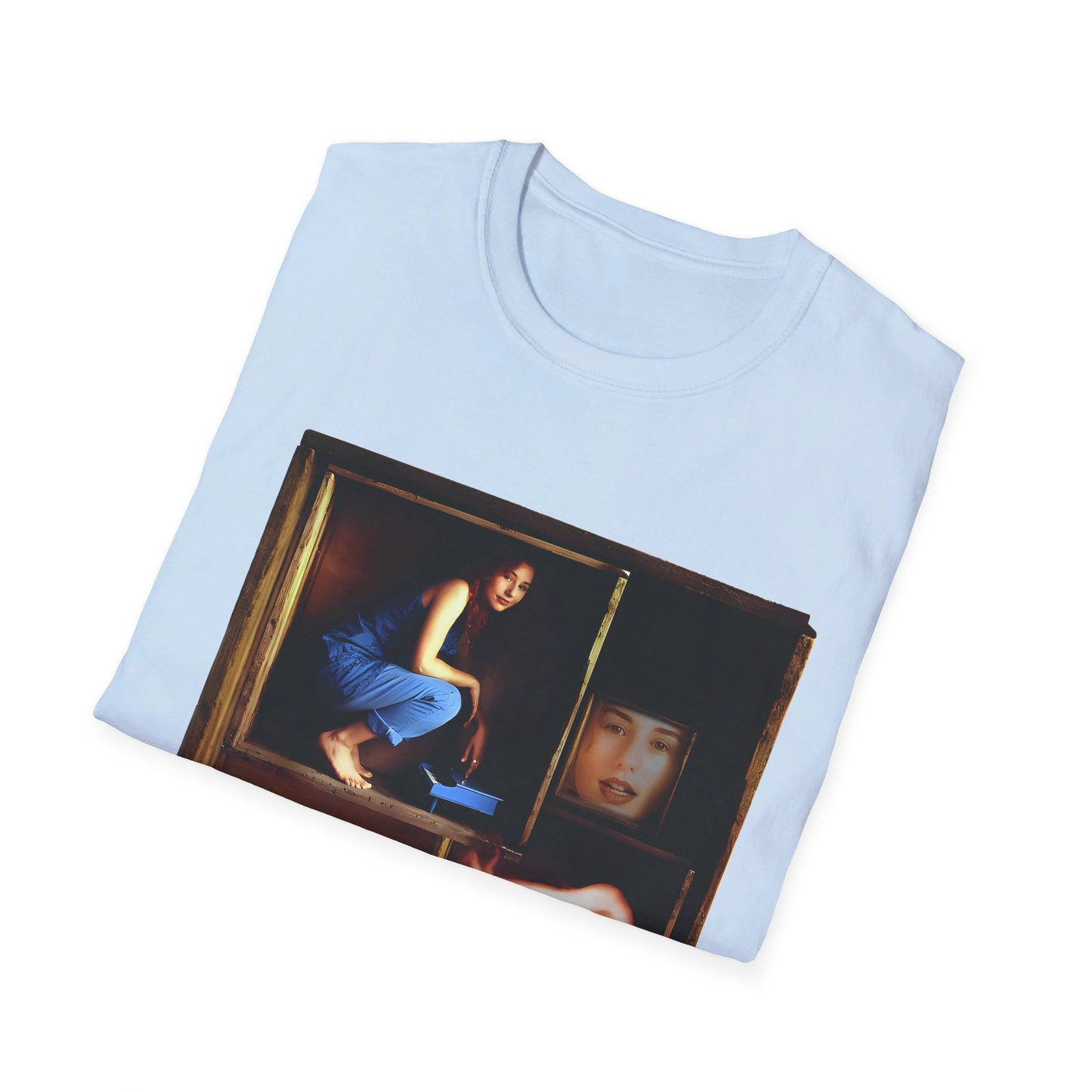 tori amos on a shelf in a crate playing a small piano surrounded by other amos's on a tshirt