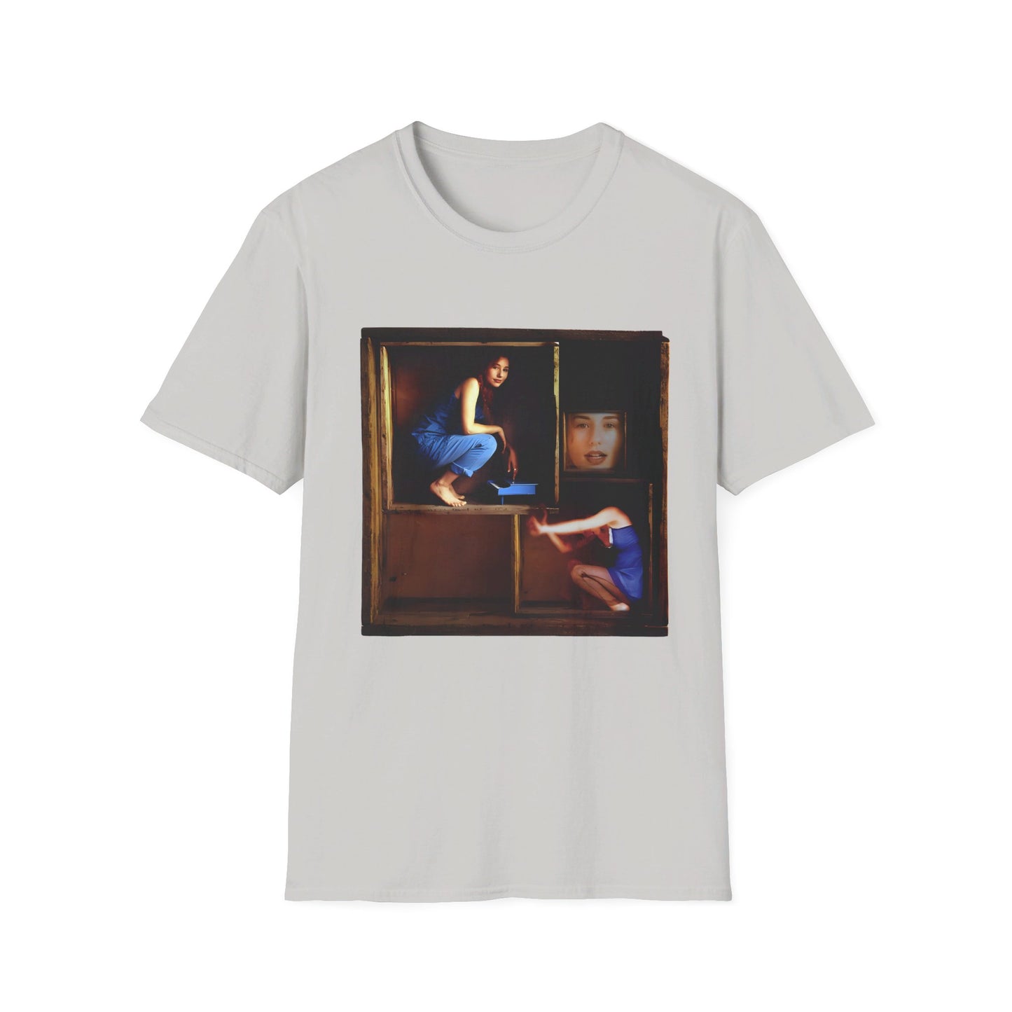 tori amos on a shelf in a crate playing a small piano surrounded by other amos's on a tshirt