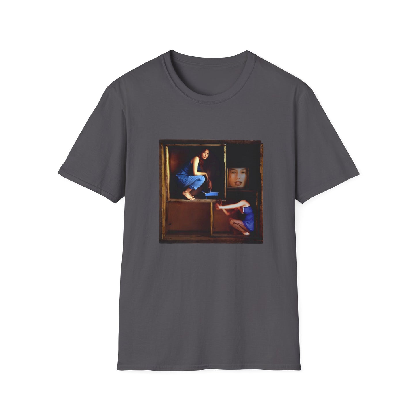 tori amos on a shelf in a crate playing a small piano surrounded by other amos's on a tshirt