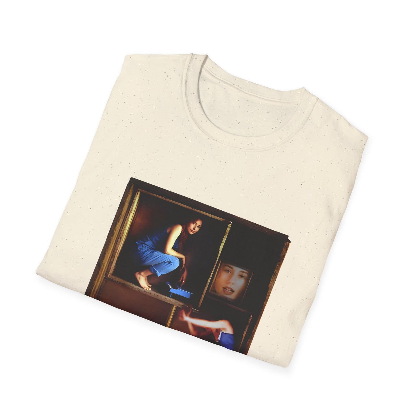 tori amos on a shelf in a crate playing a small piano surrounded by other amos's on a tshirt