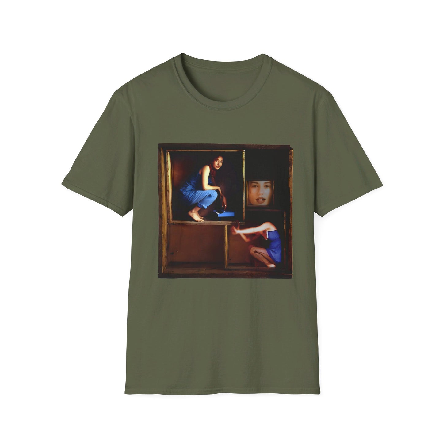 tori amos on a shelf in a crate playing a small piano surrounded by other amos's on a tshirt