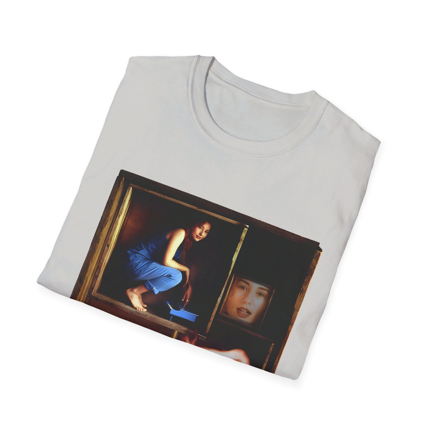 tori amos on a shelf in a crate playing a small piano surrounded by other amos's on a tshirt