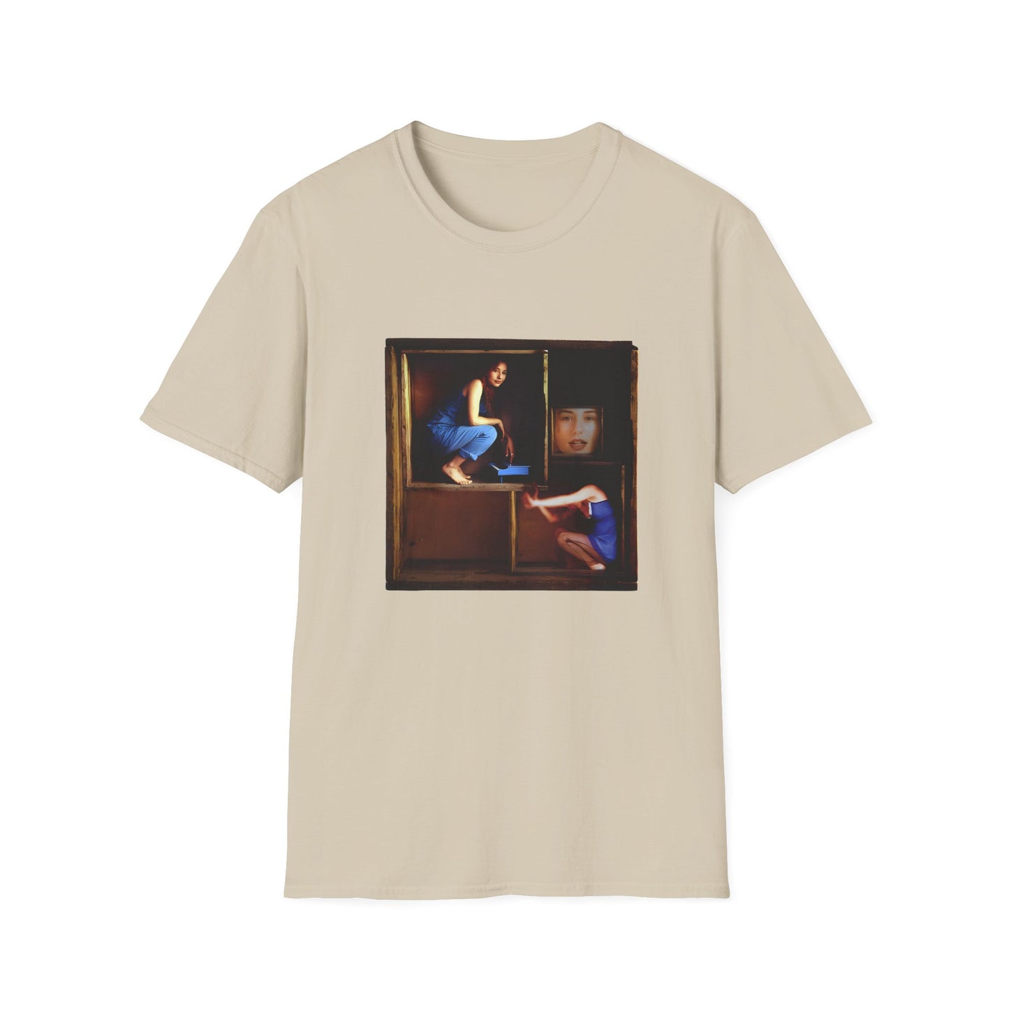 tori amos on a shelf in a crate playing a small piano surrounded by other amos's on a tshirt